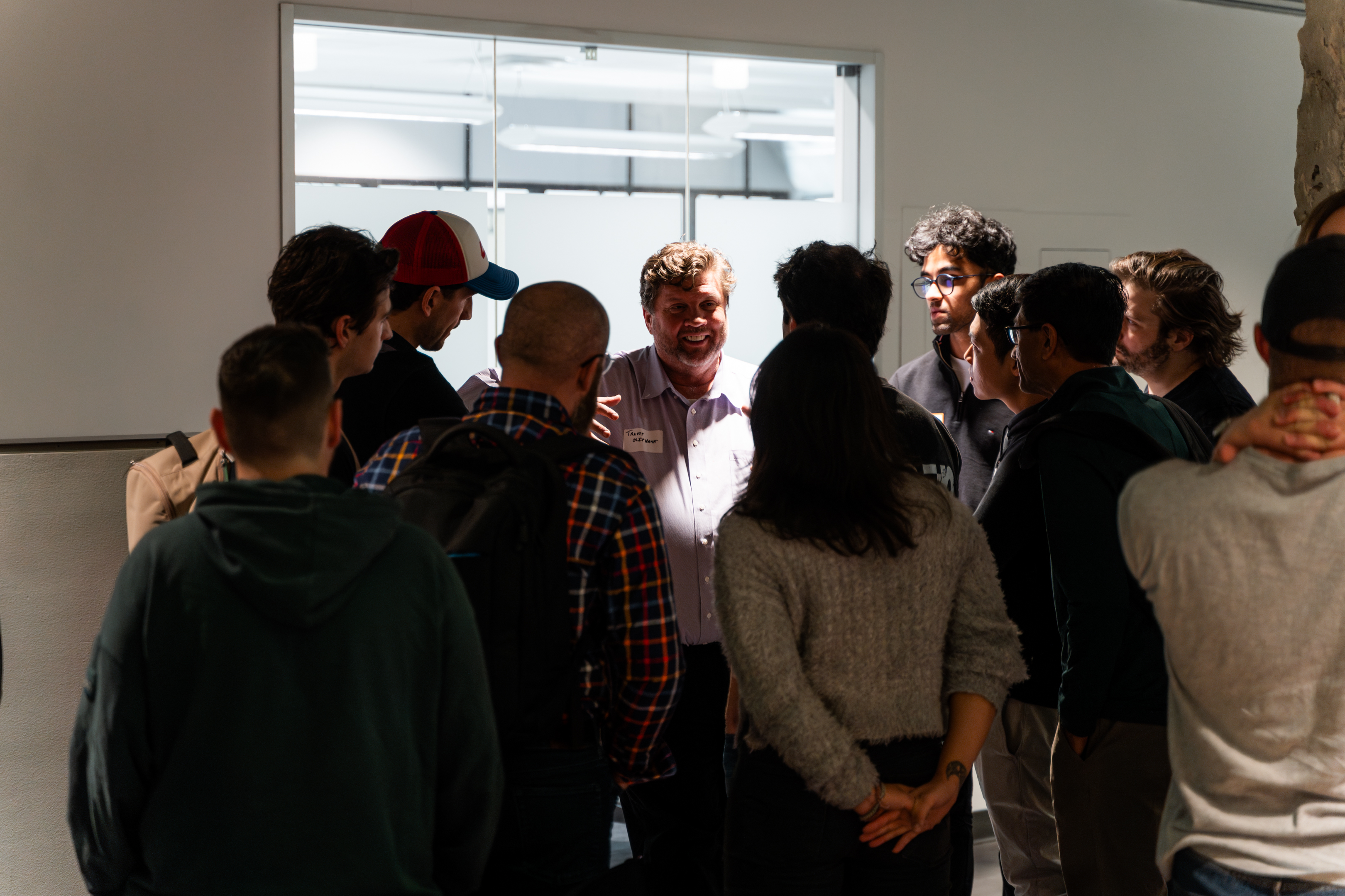 Travis Oliphant networking with practitioners at an AAS event