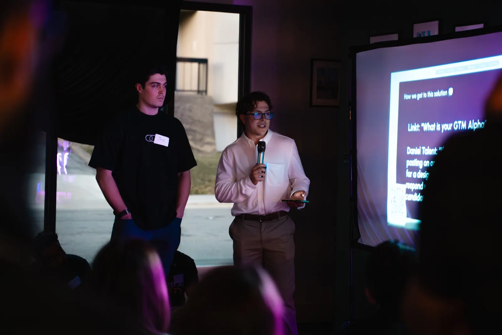 Practitioners presenting their work at an Applied AI Live event